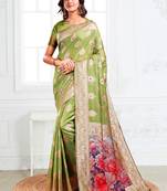 Light green woven linen silk blend saree with floral print pallu