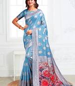 Light blue woven linen silk blend saree with floral print pallu