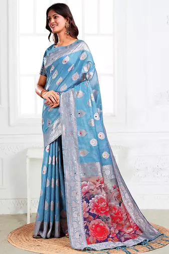 Light blue woven linen silk blend saree with floral print pallu