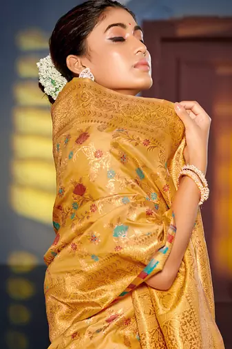Mustard banarasi silk blend saree with rich gold zari floral weaving