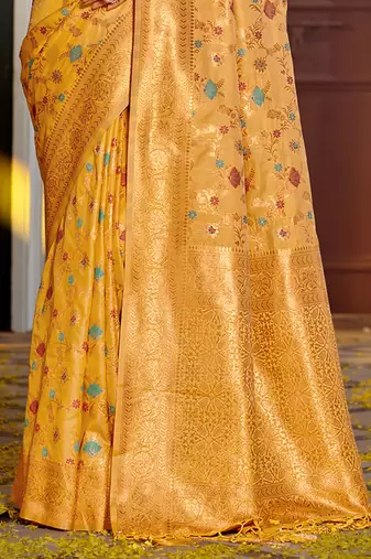 Mustard banarasi silk blend saree with rich gold zari floral weaving