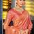 Pink banarasi silk blend saree with rich gold zari floral weaving