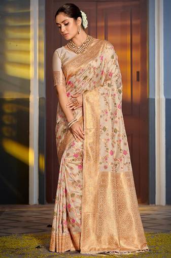 Cream banarasi silk blend saree with rich gold zari floral weaving