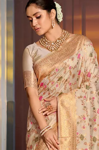Cream banarasi silk blend saree with rich gold zari floral weaving