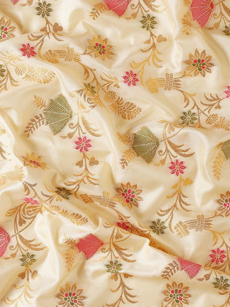 Cream banarasi silk blend saree with rich gold zari floral weaving