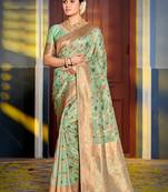 Mint green banarasi silk blend saree with rich gold zari floral weaving