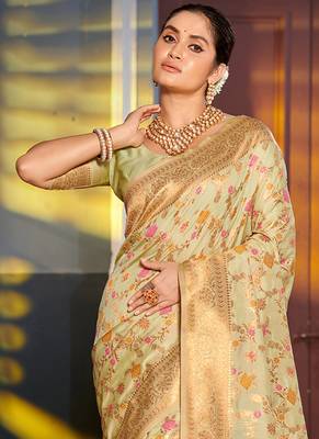 Light pistachio green banarasi silk blend saree with rich gold zari floral weaving 2