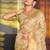 Light pistachio green banarasi silk blend saree with rich gold zari floral weaving
