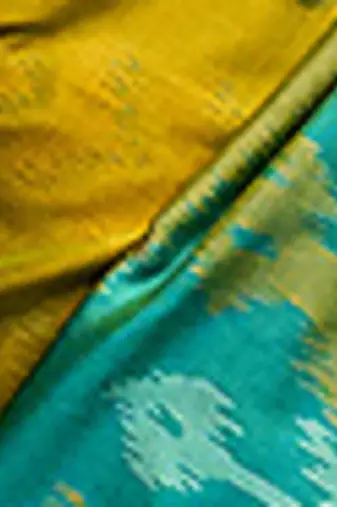 Mustard & sea green woven pochampally silk blend saree with unstitched blouse piece