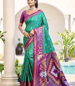 Sea green & purple woven pochampally silk blend saree with unstitched blouse piece