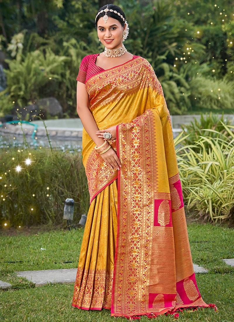 Mustard banarasi silk blend woven saree with unstitched blouse piece