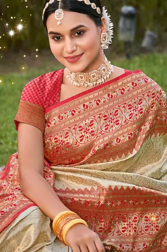 Cream banarasi silk blend woven saree with unstitched blouse piece