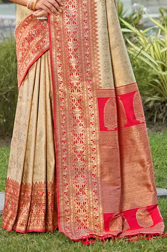 Cream banarasi silk blend woven saree with unstitched blouse piece