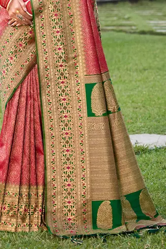 Coral pink banarasi silk blend woven saree with unstitched blouse piece