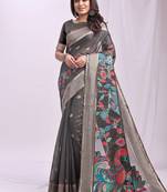 Grey handwoven linen cotton blend saree with multicolor peacock motif pallu & zari border