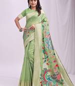 Light green handwoven linen cotton blend saree with multicolor peacock motif pallu & zari border