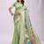Light green handwoven linen cotton blend saree with multicolor peacock motif pallu & zari border
