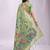 Light green handwoven linen cotton blend saree with multicolor peacock motif pallu & zari border
