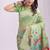 Light green handwoven linen cotton blend saree with multicolor peacock motif pallu & zari border