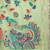 Light green handwoven linen cotton blend saree with multicolor peacock motif pallu & zari border