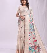Off white handwoven linen cotton blend saree with multicolor peacock motif pallu & zari border