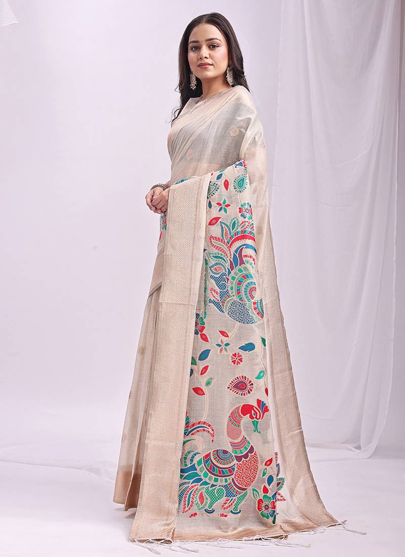 Off white handwoven linen cotton blend saree with multicolor peacock motif pallu & zari border