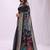 Black handwoven linen cotton blend saree with multicolor peacock motif pallu & zari border