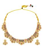 Gold plated faux ruby faux emerald studded goddess laxmi necklace & earrings set