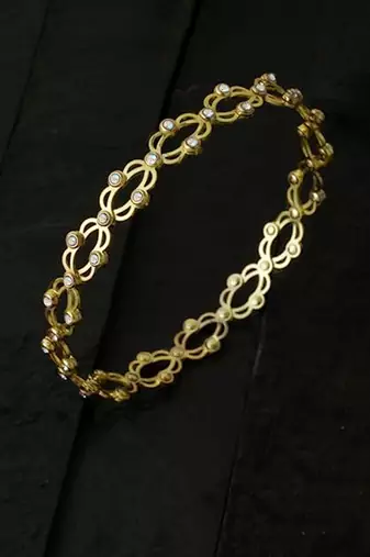 Gold plated cubic zirconia studded fancy charm bracelet cum ring jewellery for women & girls