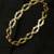 Gold plated cubic zirconia studded fancy charm bracelet cum ring jewellery for women & girls