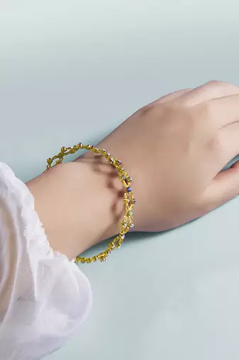 Gold plated cubic zirconia studded fancy charm bracelet cum ring jewellery for women & girls