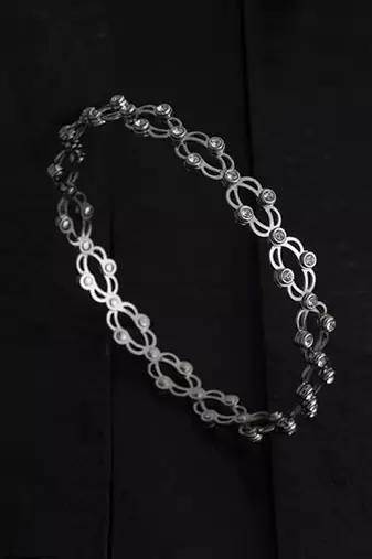 Silver plated cubic zirconia studded fancy charm bracelet cum ring jewellery for women & girls
