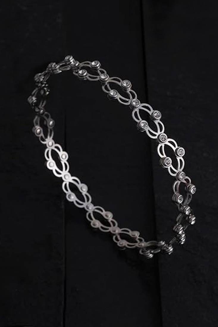 Silver plated cubic zirconia studded fancy charm bracelet cum ring jewellery for women & girls