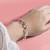 Silver plated cubic zirconia studded fancy charm bracelet cum ring jewellery for women & girls