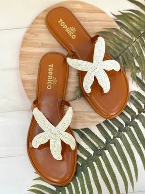 Tan embroidered faux leather flat sandals for women 1
