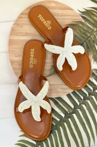 Tan embroidered faux leather flat sandals for women