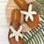 Tan embroidered faux leather flat sandals for women