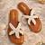 Tan embroidered faux leather flat sandals for women