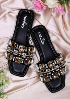 Black champagne embellished faux leather slip-on flats for women 1