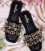 Black champagne embellished faux leather slip-on flats for women