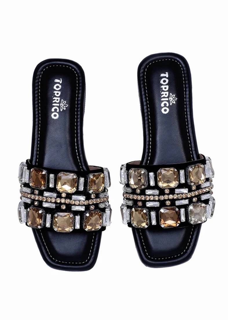 Black champagne embellished faux leather slip-on flats for women