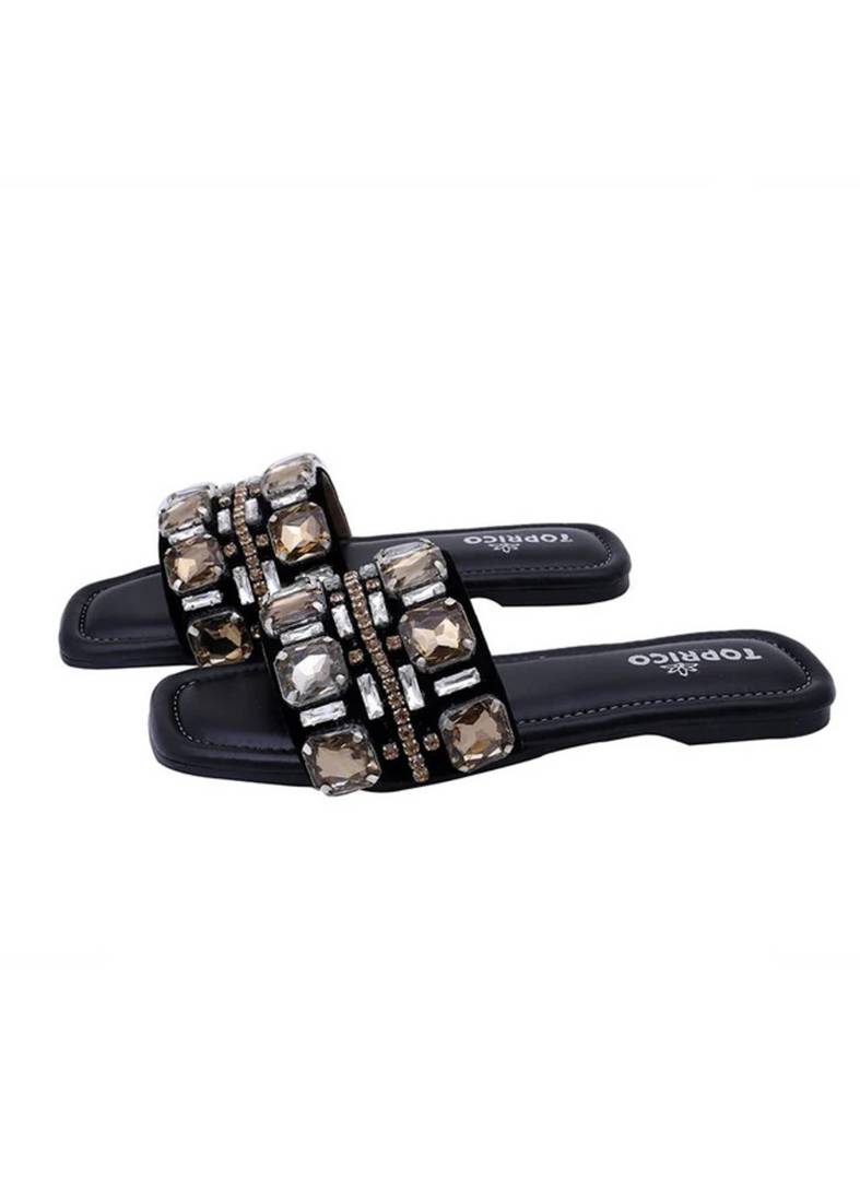 Black champagne embellished faux leather slip-on flats for women