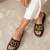 Black embellished faux leather boss babe flat slides for women