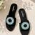 Black beaded faux leather evil eye flats for women