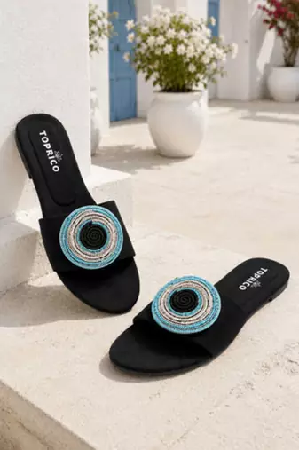 Black beaded faux leather evil eye flats for women