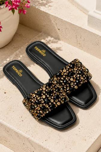 Black crystal embellished faux leather flats for women