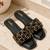 Black crystal embellished faux leather flats for women