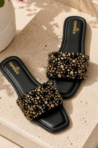 Black crystal embellished faux leather flats for women