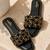 Black crystal embellished faux leather flats for women