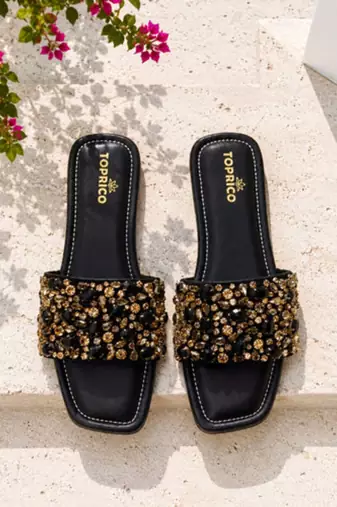Black crystal embellished faux leather flats for women